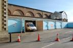 Tesco shopping delivery van parked in temporary loading bay