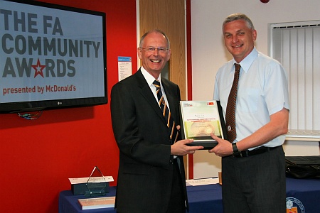 Martin Lee of Bradley Stoke Youth FC receives the award