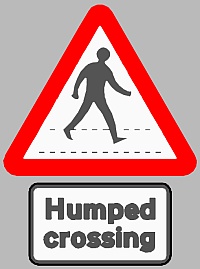 Humped crossing warning sign