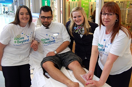 Bradley Stoke Specsavers charity leg-waxing
