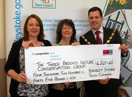 Presentation of a cheque to the Three Brooks Nature Conservation Group.