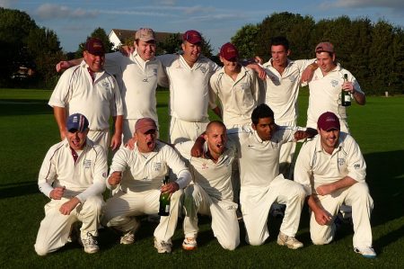 Bradley Stoke Cricket Club 1st XI players celebrate winning promotion.