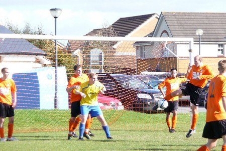 BSTFC 1st Team - Nick Favell with some strong defending.