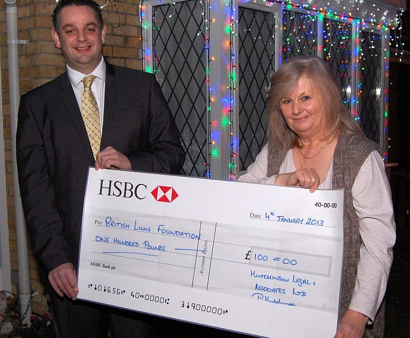 Bradley Stoke "best Christmas lights" cheque presentation.