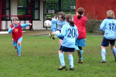 Bradley Stoke Youth FC Under-12 Girls in action against AEK Boco.