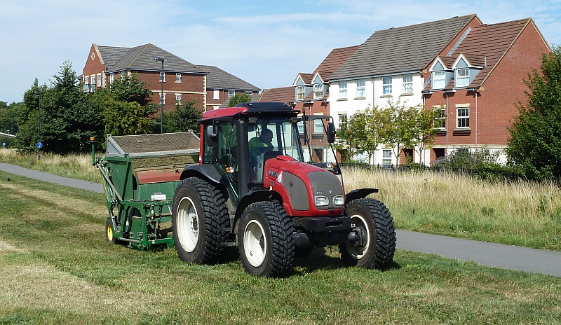 South Gloucestershire Council grass cutter on Bradley Stoke Way.