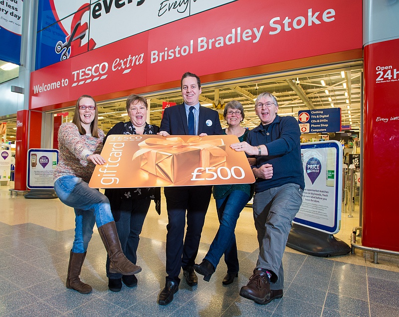 Shoppers collect £500 prizes at Tesco Extra, Bradley Stoke.