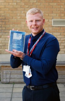 Matt Smith, a teacher at Meadowbrook Primary School in Bradley Stoke, with his Pearson Teaching Award.