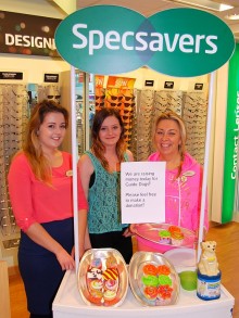 Staff at the Specsavers store in Bradley Stoke sell cupcakes in support of Guide Dogs Week. L-R: Beth, Hollie and Marcela.