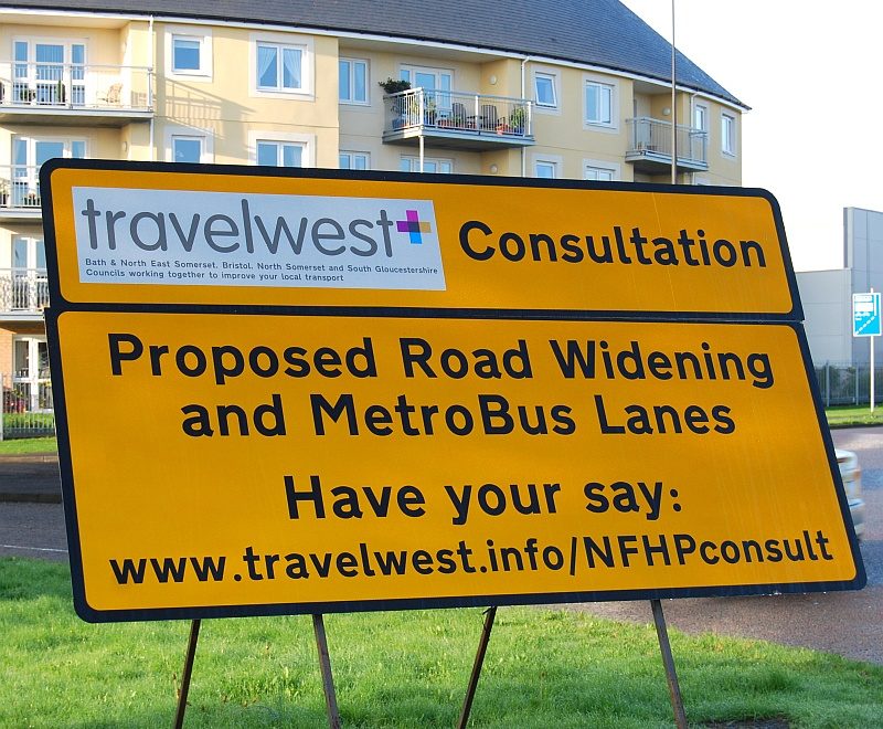 Sign advertising consultation on proposed road widening and bus lanes associated with the North Fringe to Hengrove Package MetroBus scheme.