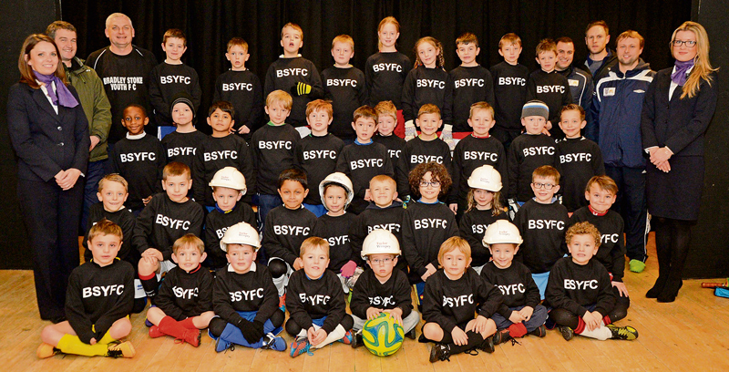 Bradley Stoke Youth FC's U7 players wearing sweatshirts funded by housebuilder Taylor Wimpey.