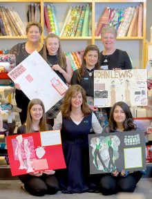 BSCS students Chloe Lorenzi (front left) and Simran Kaur (front right) with other finalists and staff from the John Lewis store at Cribbs Causeway.