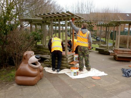 Community Payback service users at work in the grounds of Bowsland Green Primary School, Bradley Stoke.