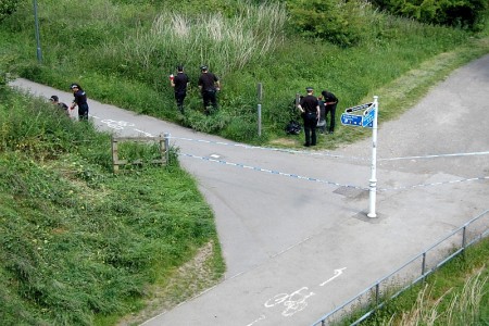 Police search an area in the Three Brooks Local Nature Reserve, Bradley Stoke.