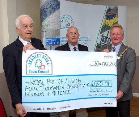 Brian Hewitt MBE (left) and John Moloney of RBL Stoke Gifford receive a charity collection cheque from Cllr John Ashe, mayor of Bradley Stoke.
