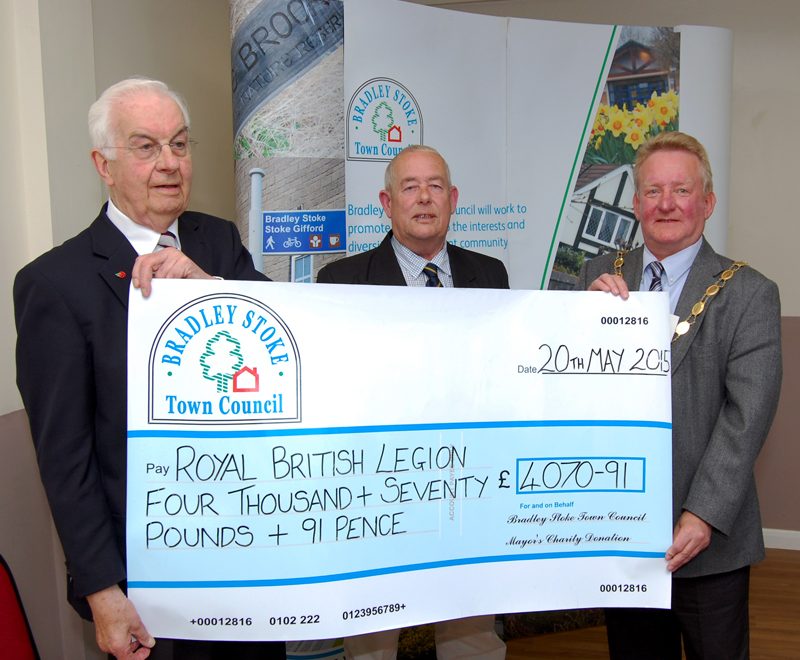Brian Hewitt MBE (left) and John Moloney of RBL Stoke Gifford receive a charity coolection cheque from Cllr John Ashe, mayor of Bradley Stoke.