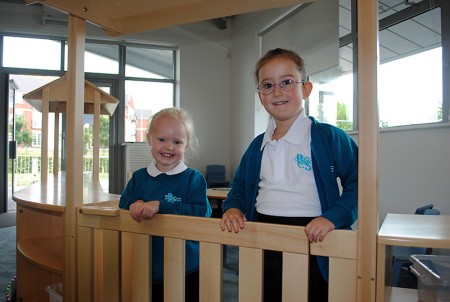 Pupils due to start in the Reception class at BSCS in September try out a play area in one of the classrooms.