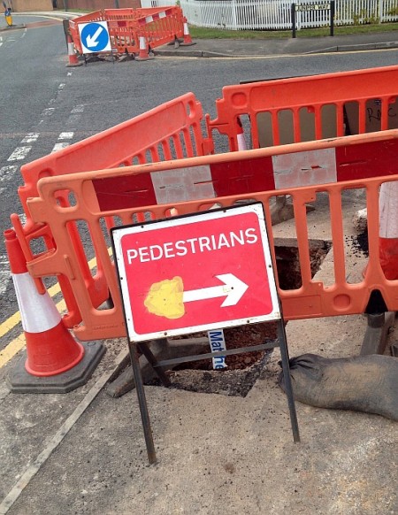 Virgin Media roadworks on Webbs Wood Road, Bradley Stoke, Bristol.