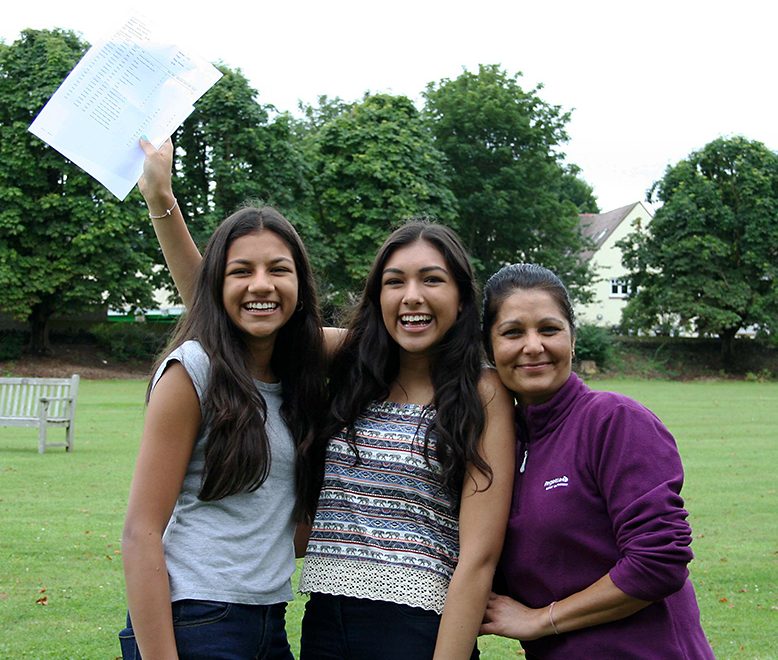 Red Maids' School GCSE results: Neha Mehta (centre) celebrates with her mother Sapna and younger sister Niki, also a Red Maid.