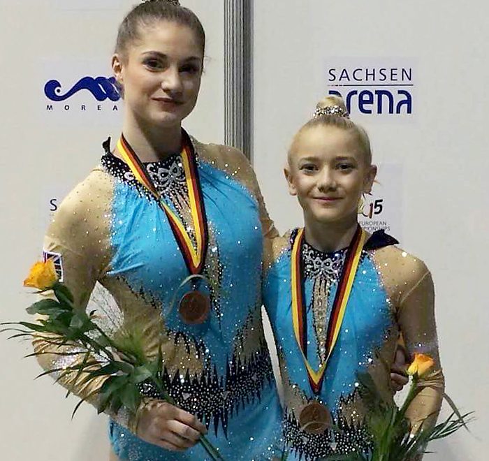 Abigail Hipkiss (left) and Tiana McClurg, pictured after being presented with their bronze medals at the European Acrobatic Gymnastics Championships.