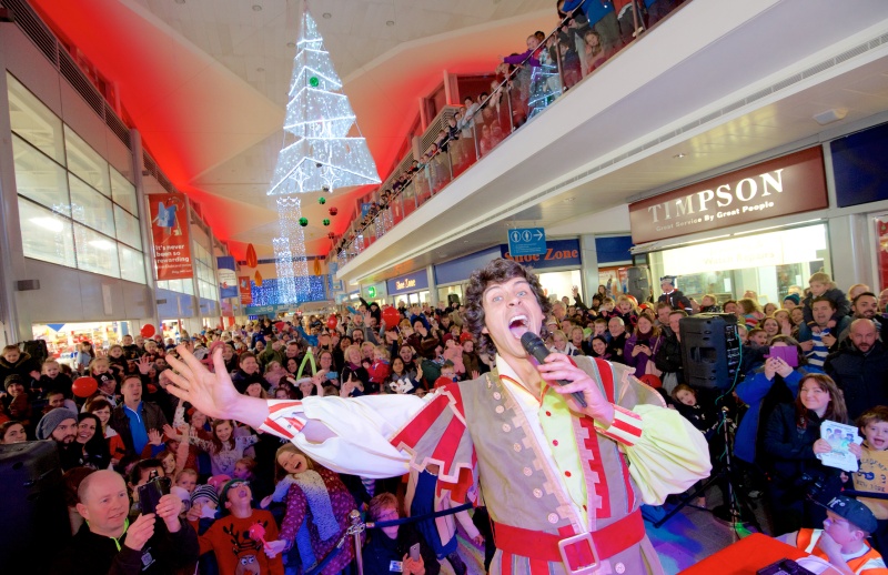 Andy Day switches on the Christmas lights at the Willow Brook Centre in Bradley Stoke, Bristol.