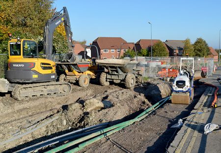 MetroBus construction at Woodlands Lane: Gas main and complex cable ducting have caused delays.