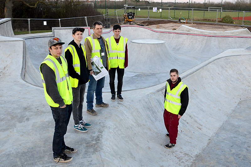 Youth participation worker Graham Baker (third from left) and local young people inspect progress on the construction of the new skate park in the grounds of Bradley Stoke Leisure Centre.