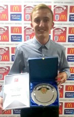 Matt Smith of Bradley Stoke Youth FC, pictured after being presented with the Young Coach of the Year award by the Gloucestershire FA.
