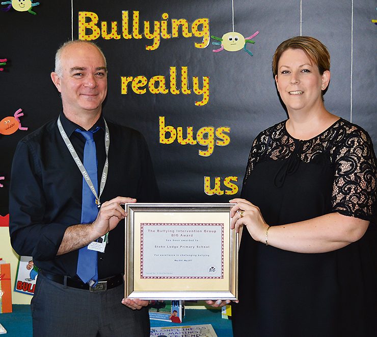 Stoke Lodge Primary School headteacher Richard Clark (left) and anti-bullying co-ordinator Claire Bruford with the school’s BIG award certificate