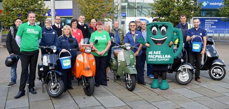 A team of classic scooter riders prepare to set off from the Tesco Extra store in Bradley Stoke on a charity relay in aid of Macmillan Cancer Support.