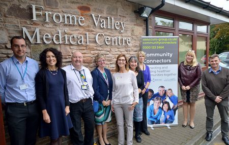 Launching Community Connectors at Frome Valley Medical Centre, L-r: Cllr Jon Hunt (Chair of S Glos Children, Adults & Health Committee), Vicky Elliott (Practice Manager), Robin Woodward (Community Connectors Team Leader), Sue Jacques (South Glos Council Commissioning Officer), Hilary Jay (Community Connectors Wellbeing Worker), Dr Jane Goram (GP), Claire Rees (S Glos Health & Wellbeing Partnership Support Officer), Harriet Bosnell (Curo Director of Health, Care & Support) and Dr Jon Evans (S Glos Clinical Commissioning Group).