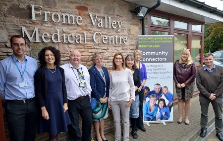 Launching Community Connectors at Frome Valley Medical Centre, L-r: Cllr Jon Hunt (Chair of S Glos Children, Adults & Health Committee), Vicky Elliott (Practice Manager), Robin Woodward (Community Connectors Team Leader), Sue Jacques (South Glos Council Commissioning Officer), Hilary Jay (Community Connectors Wellbeing Worker), Dr Jane Goram (GP), Claire Rees (S Glos Health & Wellbeing Partnership Support Officer), Harriet Bosnell (Curo Director of Health, Care & Support) and Dr Jon Evans (S Glos Clinical Commissioning Group).
