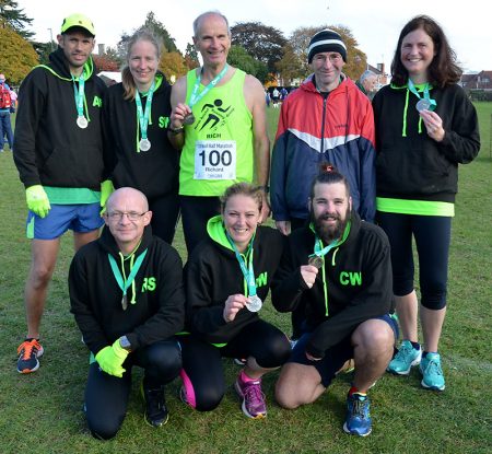 Richard Nuell (back row, centre) celebrates with friends from North Bristol Running Group after completing his 100th half marathon. Richard reached his record by completing the Stroud Half Marathon on 23rd October 2016.