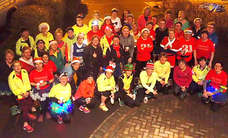 Members of Sole Sisters Running Club on a Christmas-themed training run.
