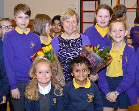 Christine Dursley (centre) headteacher of Wheatfield Primary School, on her retirement after 18 years in the post. She is pictured with pupils who played leading roles in a special farewell assembly held on Thursday 15th December 2016.