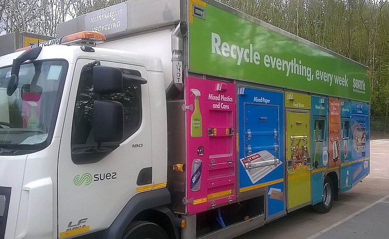 Photo of a 'Romaquip' recycling collection vehicle.