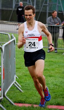 Maciej Bialogonski rounds the final turn to clinch the race in a time of 34:07.