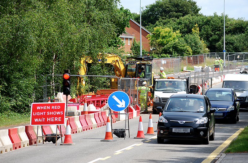 Photo of temporary traffic lights in operation between the Great Meadow and Great Stoke roundabouts.