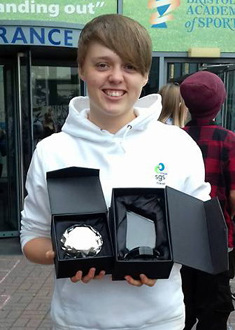 Photo of Sophie Mitchell with her prize day awards.