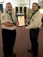 Photo of Dave Pace (right) receiving his award from Clive Mason.