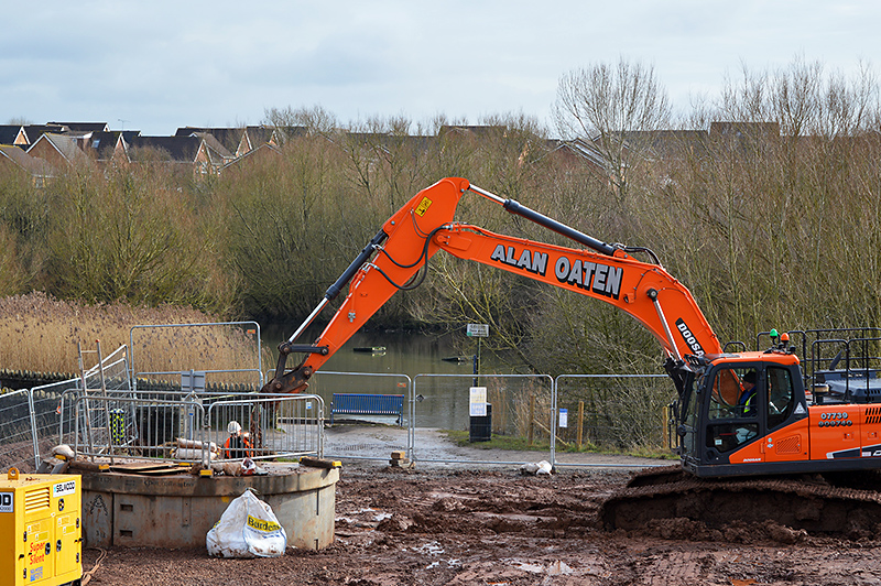 Photo of an excavator at the Wessex Water tunnelling compound.