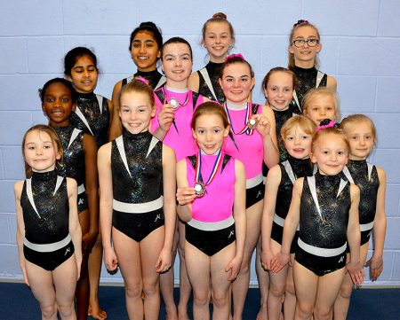 Photo of fifteen of the 16-strong squad which BS Gymnastics Club sent to the South West Prelims.