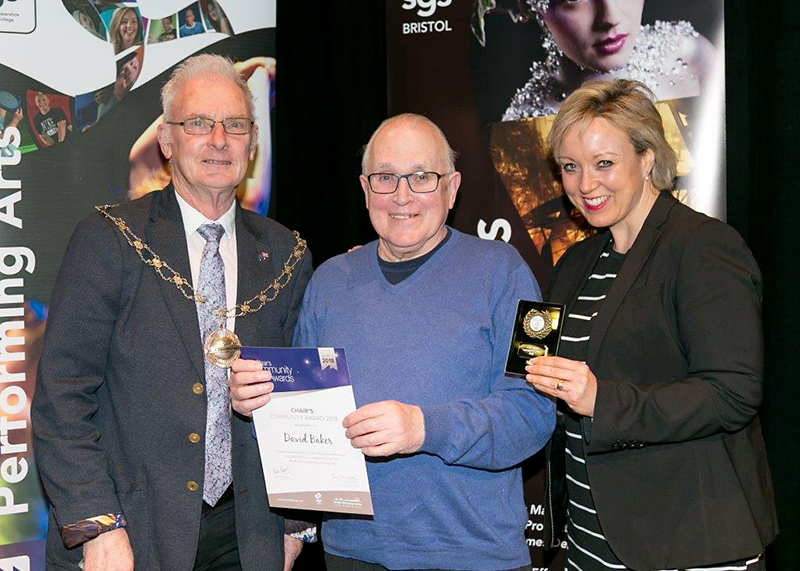 Photo of David Baker receiving his award.