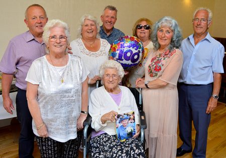 Photo of Betty Hiscox (seated) with children (l-r) Tony, Janet, Bernice, Clive, Anita, Linda and Terry.