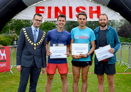 Photo of Bradley Stoke mayor Ben Randles with the first three male finishers.