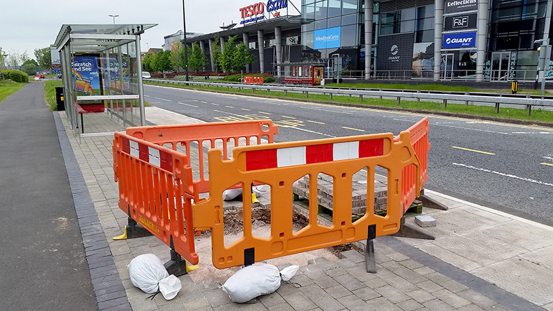 Photo showing further installation work taking place at the southbound 'Willow Brook Centre' MetroBus stop on Bradley Stoke Way.
