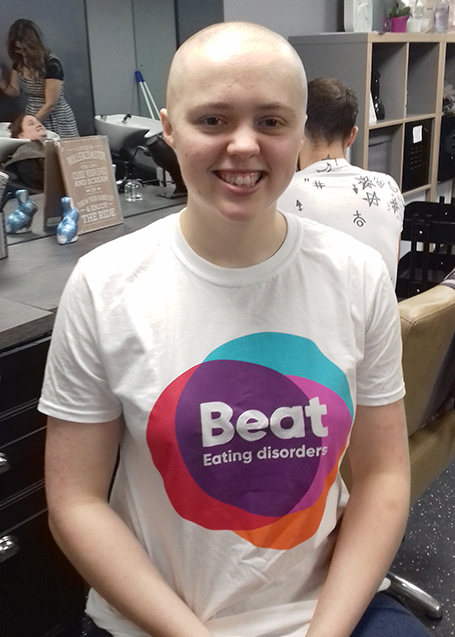 Photo of fundraiser Sophie Mitchell, pictured following her charity head shave.