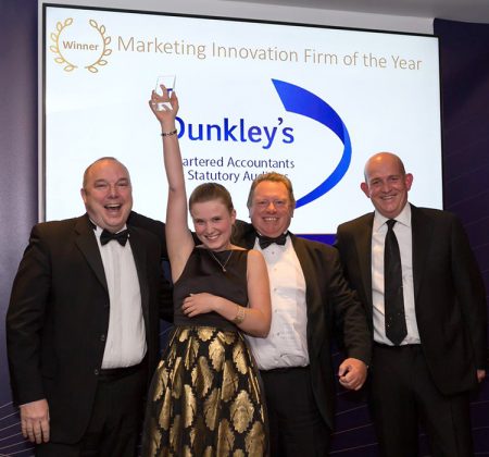 Photo of the award winners with Dunkley's marketing manager Nicole Crompton and Mike Dunkley in the centre.