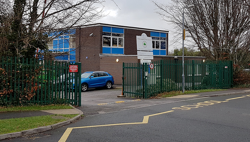 Photo of the entrance to Stoke Lodge Primary School, in School Close.