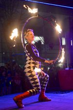 Photo of a fire juggler.